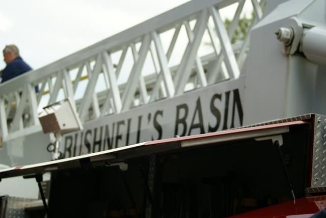 Bushnell's Basin A-310 arrives in front of the Saranac Lake Fire Station on August 4th.  It has now become Saranac Lake LT-144